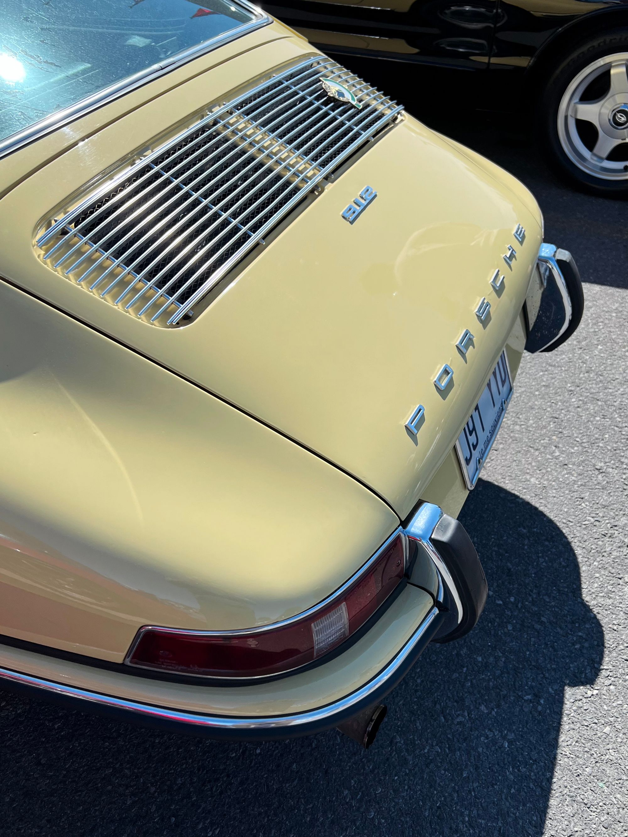 rear deck of porsche 912 from above, nurburgring badge on rear chrome vent