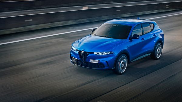 front of alfa romeo tonale cuv driving in blue