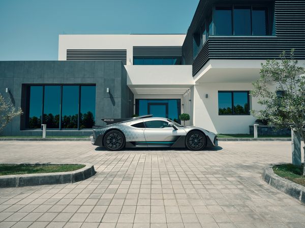Mercedes-AMG ONE in front of a house that looks like an office park